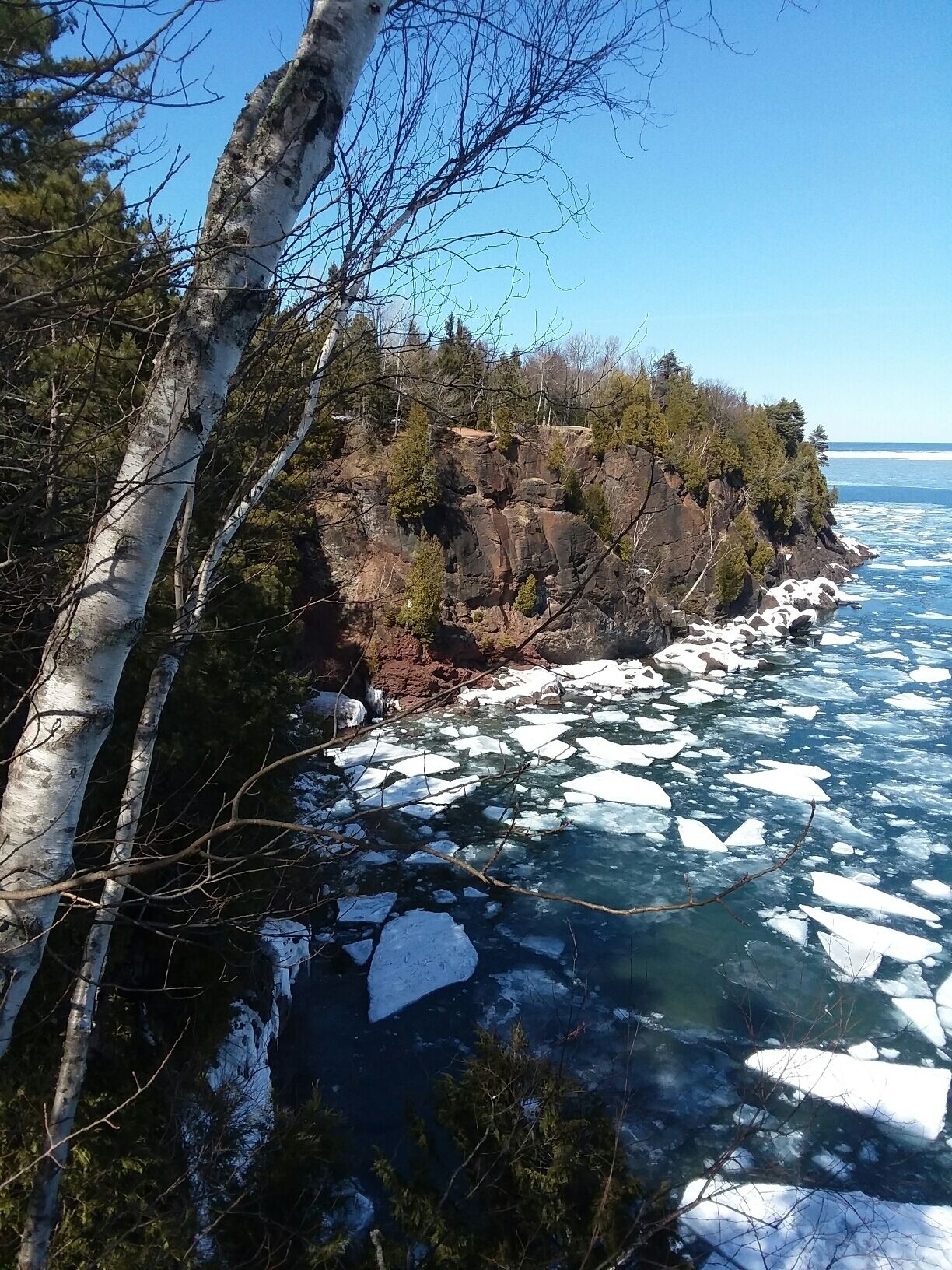 The ice flow breaking up in the spring thaw all around Preque Isle, Marquette MI. 
