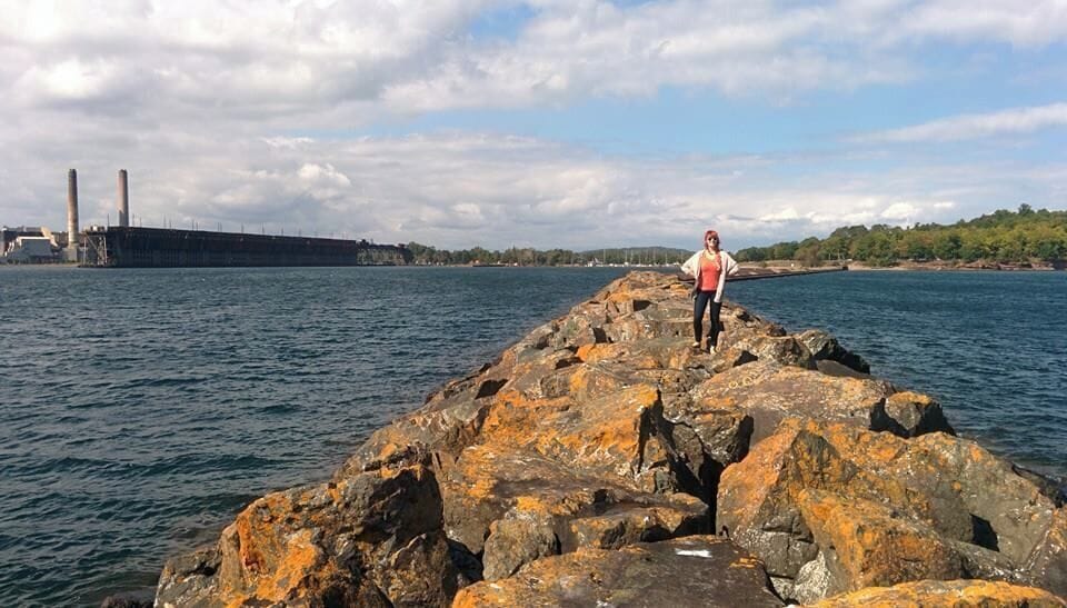 Climbing the rocks out to the lighthouse. 