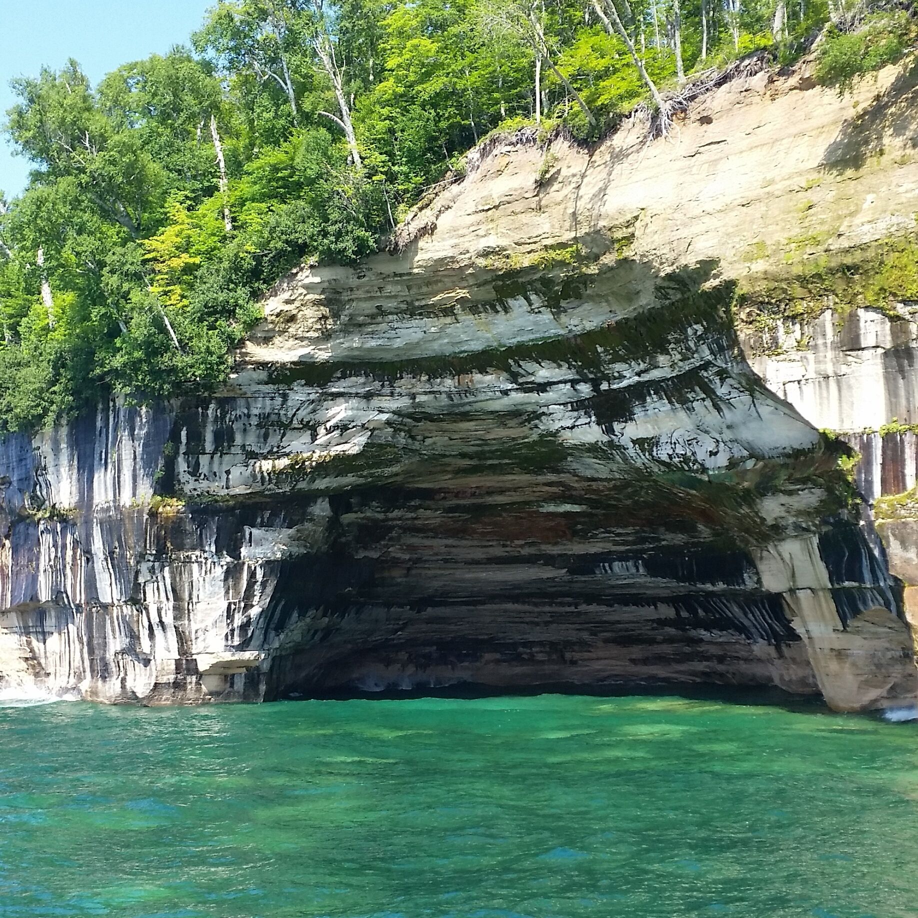 Up in the northwest UP of Michigan the granite lined cliffs get weathered away and change colors over the years!