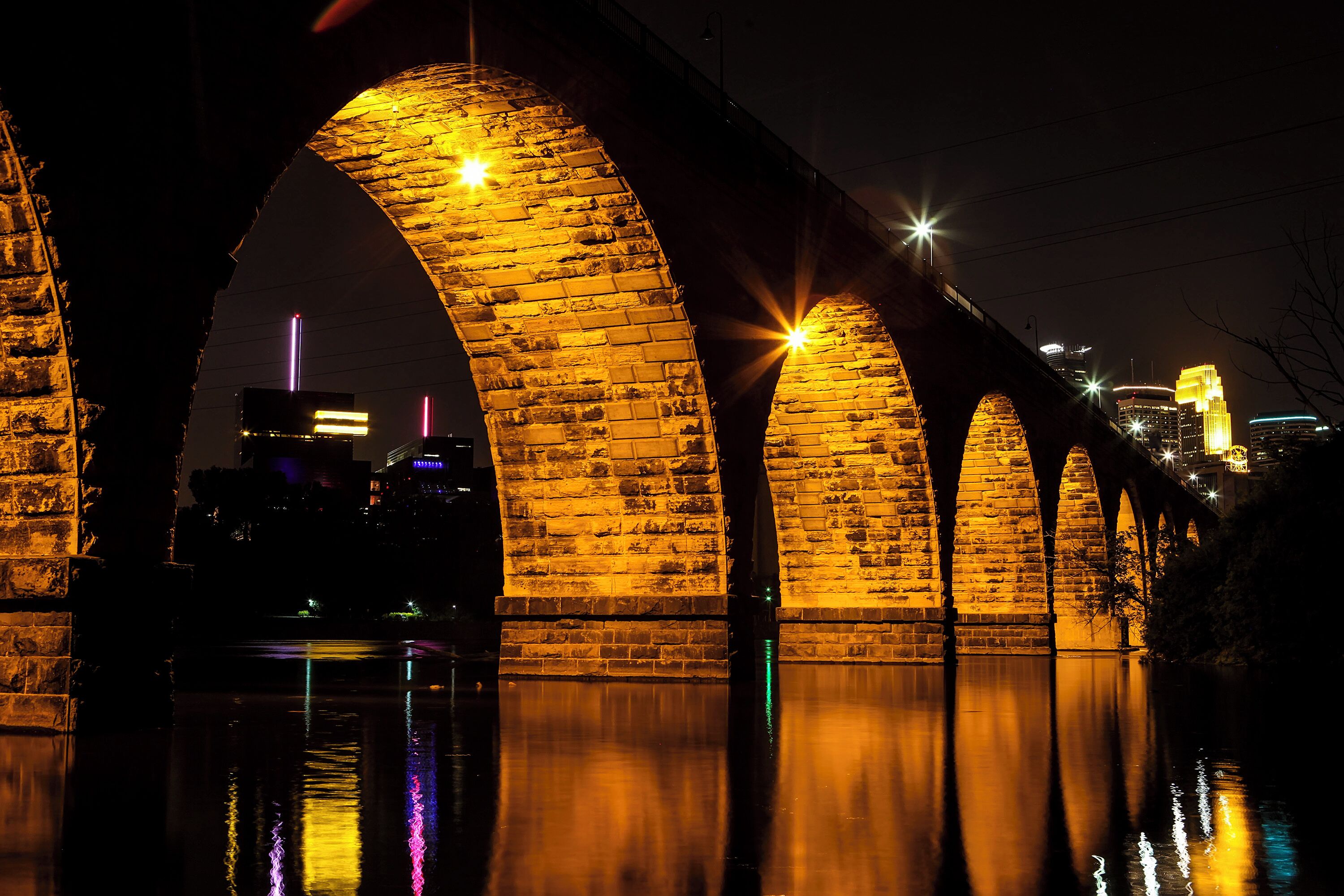 There are lots of places along the Mississippi to take photos of this iconic bridge in Minneapolis. But I loved this spot found by going down the stairs adjacent to the bridge in Father Hennepin Bluffs Park. You can see the Guthrie Theater through the arch on the left, and a bit of the city on the right.