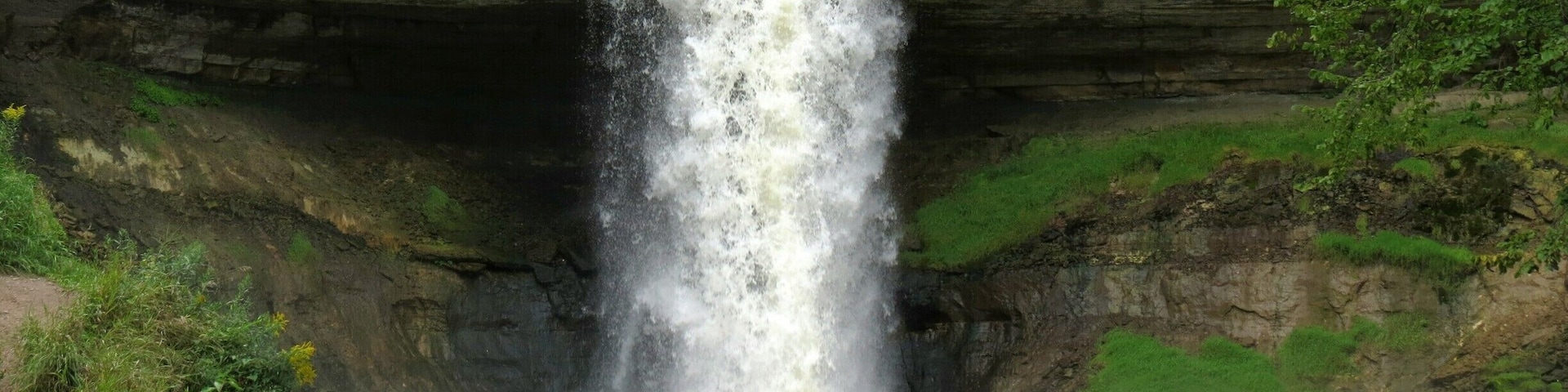 Beautiful waterfall in the city limits of Minneapolis. Continue down the trail to walk along the banks of the Mississippi River.