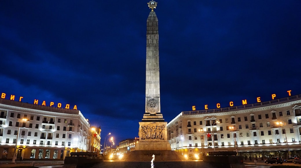 The eternal flame shines brightly at night.