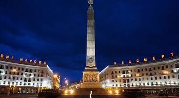The eternal flame shines brightly at night.