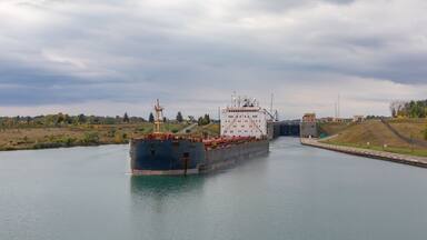 A Bulk Carrier Ship Exiting the Bertrand H. Snell Lock in Massena, New York on the St. Lawrence Seaway