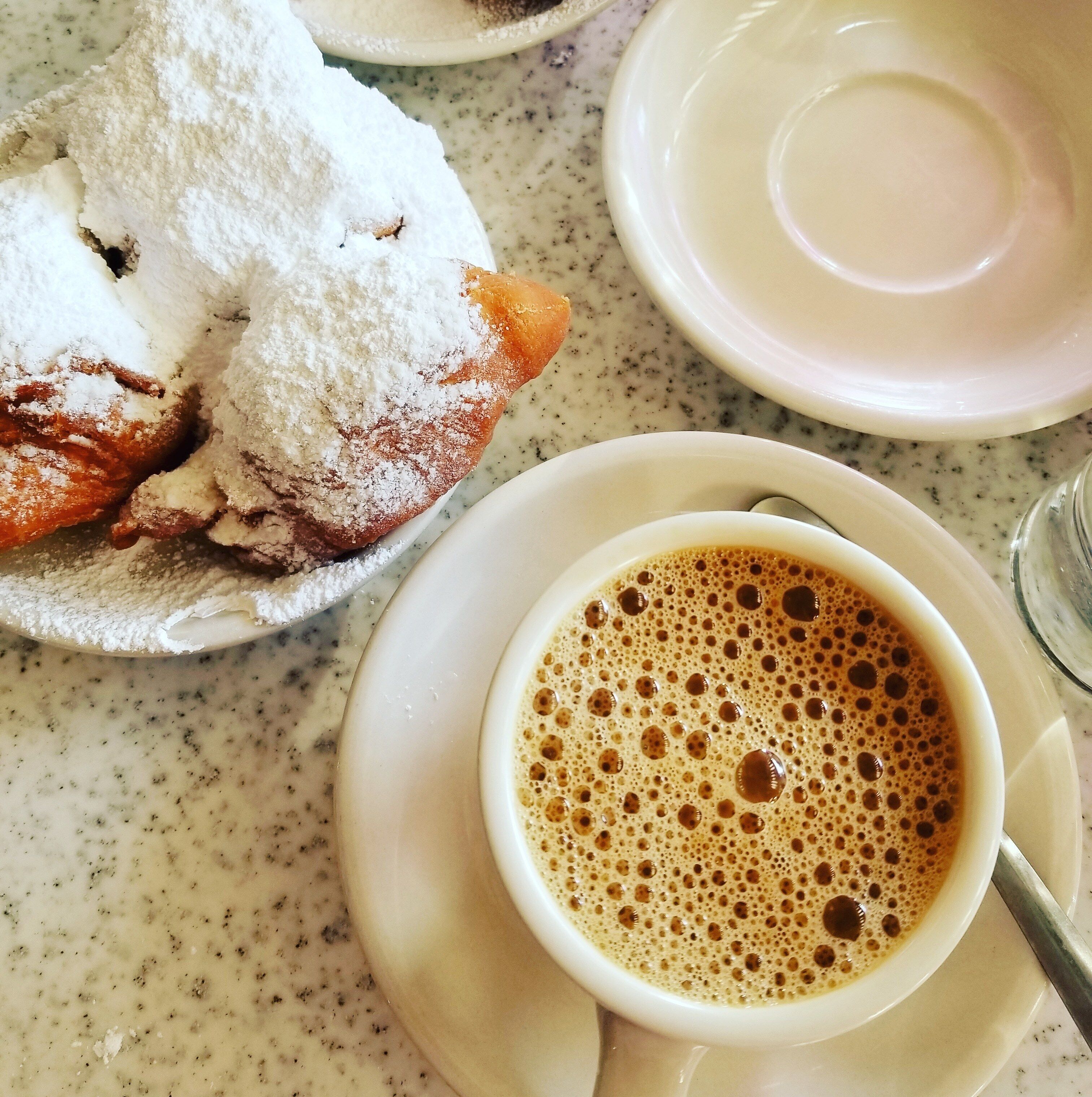 Powdered sugar covered tourist trap that's more than worth the short wait and sticky tables ☕
#beignets #doubleorder #coffee #Frenchquarter