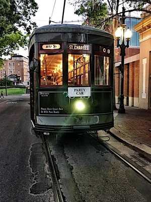 It's always a party in beautiful New Orleans. The street cars are a signature detail of a historic American city.