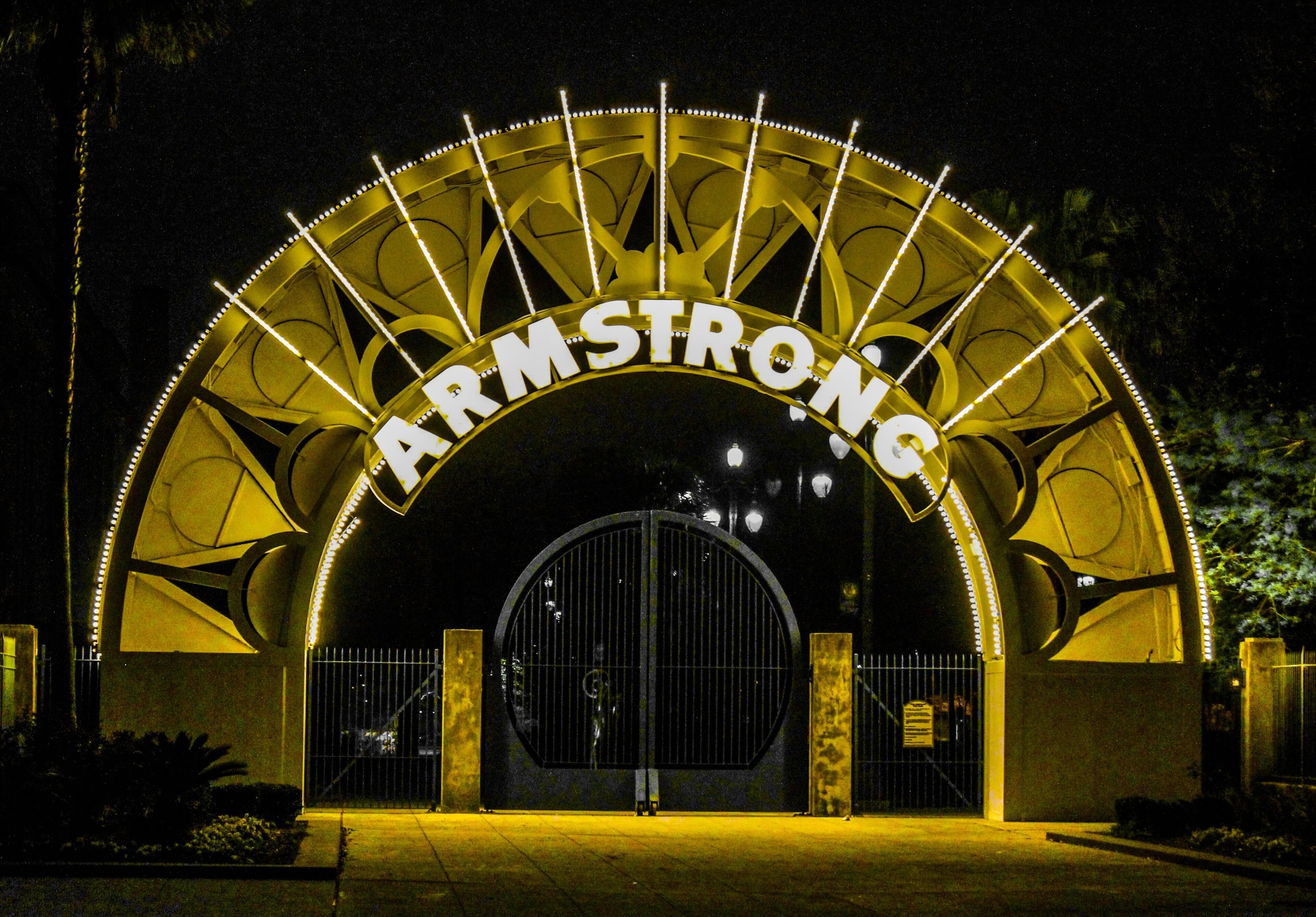 The sign is really beautiful at night.
Louis Armstrong Park is a 32-acre park located in the Tremé neighborhood of New Orleans, Louisiana, just across Rampart Street from the French Quarter.
In the 1960s a controversial urban renewal project leveled a substantial portion of the Tremé neighborhood adjacent to Congo Square. After a decade of debate, the City created the present-day park from that land. This park was designed by New Orleans architect Robin Riley and was named after New Orleans-born Jazz legend Louis Armstrong.
The footprint of the present-day park contains the New Orleans Municipal Auditorium, the Mahalia Jackson Theater for the Performing Arts and several buildings owned by the New Orleans Jazz National Historical Park. The portion of the park immediately in front of the New Orleans Municipal Auditorium is the site of Congo Square, formerly known as Beauregard Square, famous for its role in the history of African American music and spiritual practice.
Some elements of the park's design have been subject to critique throughout the years. Residents of the adjacent Tremé and French Quarter neighborhoods have called for the removal of the large fence that separates the park from surrounding areas and for incorporating the large concrete parking lots in the rear of the park into the park's greenspace.   The presence of these parking lots are often attributed to high rates of subsidence and flooding along N. Villere Street.
Louis Armstrong Park was home to the first New Orleans Jazz & Heritage Festival in 1970. While that festival has moved to the larger space of New Orleans Fairgrounds, Armstrong Park has more recently been the home of many other events, including the "Jazz in the Park" free concert series, the Treme Creole Gumbo Fest, and the Louisiana Cajun & Zydeco Festival.
Monuments include a 12-foot statue of Louis Armstrong by Elizabeth Catlett, a bust of Sidney Bechet, and a depiction of Buddy Bolden.
#LIFEATEXPEDIA #NEWORLEANS #IHEARTNOLA #TRAVEL
