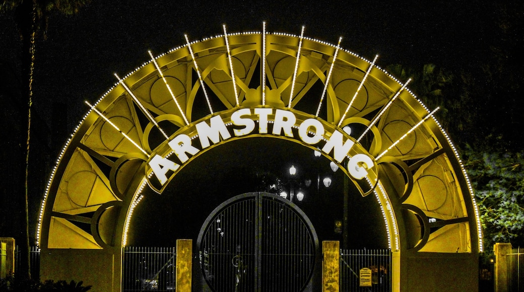 The sign is really beautiful at night.
Louis Armstrong Park is a 32-acre park located in the Tremé neighborhood of New Orleans, Louisiana, just across Rampart Street from the French Quarter.
In the 1960s a controversial urban renewal project leveled a substantial portion of the Tremé neighborhood adjacent to Congo Square. After a decade of debate, the City created the present-day park from that land. This park was designed by New Orleans architect Robin Riley and was named after New Orleans-born Jazz legend Louis Armstrong.
The footprint of the present-day park contains the New Orleans Municipal Auditorium, the Mahalia Jackson Theater for the Performing Arts and several buildings owned by the New Orleans Jazz National Historical Park. The portion of the park immediately in front of the New Orleans Municipal Auditorium is the site of Congo Square, formerly known as Beauregard Square, famous for its role in the history of African American music and spiritual practice.
Some elements of the park's design have been subject to critique throughout the years. Residents of the adjacent Tremé and French Quarter neighborhoods have called for the removal of the large fence that separates the park from surrounding areas and for incorporating the large concrete parking lots in the rear of the park into the park's greenspace. The presence of these parking lots are often attributed to high rates of subsidence and flooding along N. Villere Street.
Louis Armstrong Park was home to the first New Orleans Jazz & Heritage Festival in 1970. While that festival has moved to the larger space of New Orleans Fairgrounds, Armstrong Park has more recently been the home of many other events, including the "Jazz in the Park" free concert series, the Treme Creole Gumbo Fest, and the Louisiana Cajun & Zydeco Festival.
Monuments include a 12-foot statue of Louis Armstrong by Elizabeth Catlett, a bust of Sidney Bechet, and a depiction of Buddy Bolden.
#LIFEATEXPEDIA #NEWORLEANS #IHEARTNOLA #TRAVEL