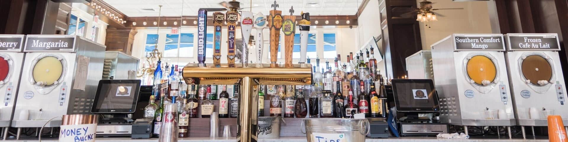 The signature lighted arch of Cafe Beignet in the bar area at their Decatur St. location in New Orleans, Louisiana.