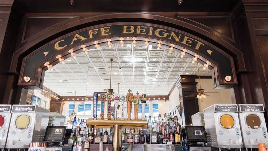 The signature lighted arch of Cafe Beignet in the bar area at their Decatur St. location in New Orleans, Louisiana.