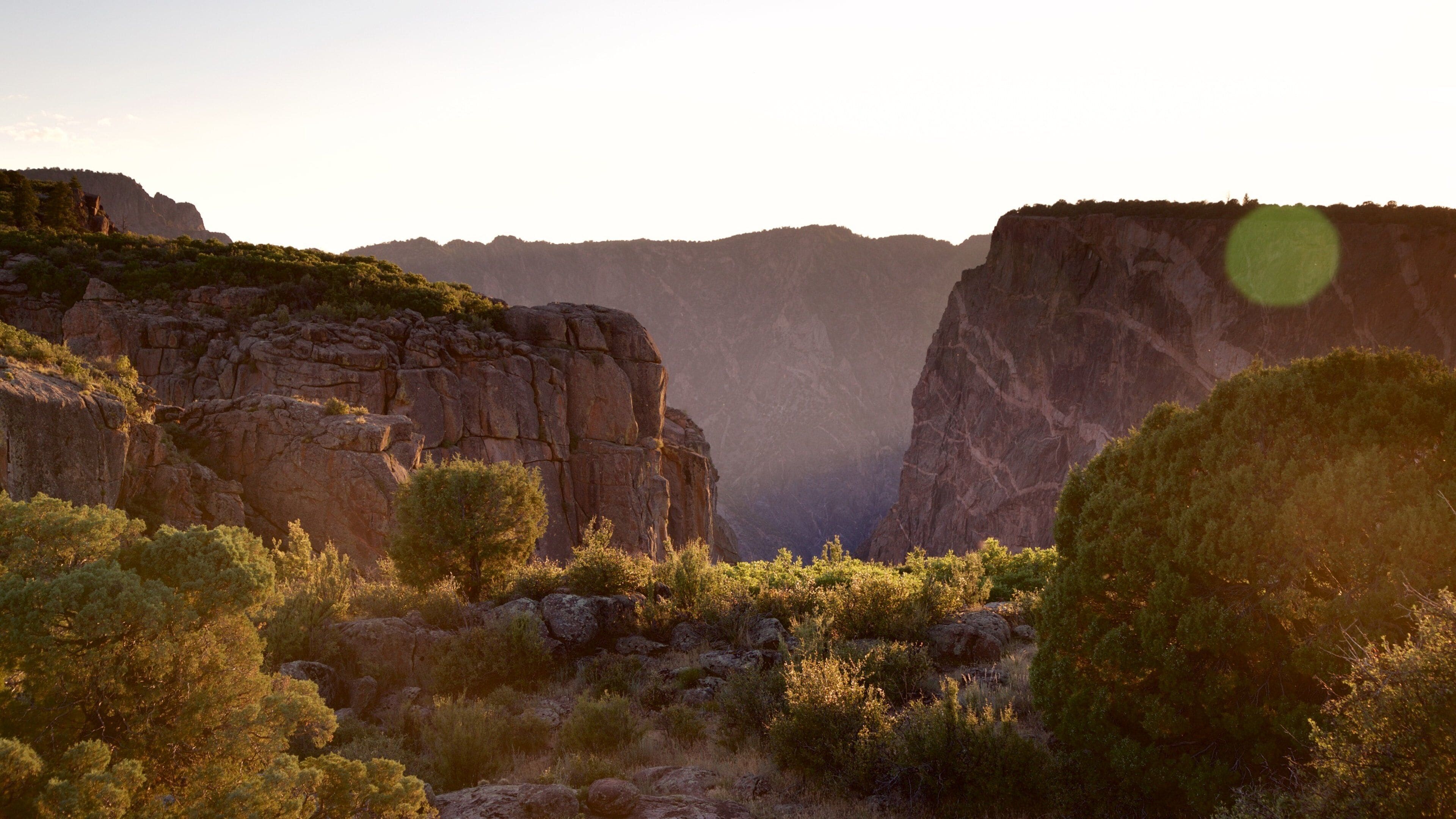Montrose featuring a sunset, landscape views and a gorge or canyon