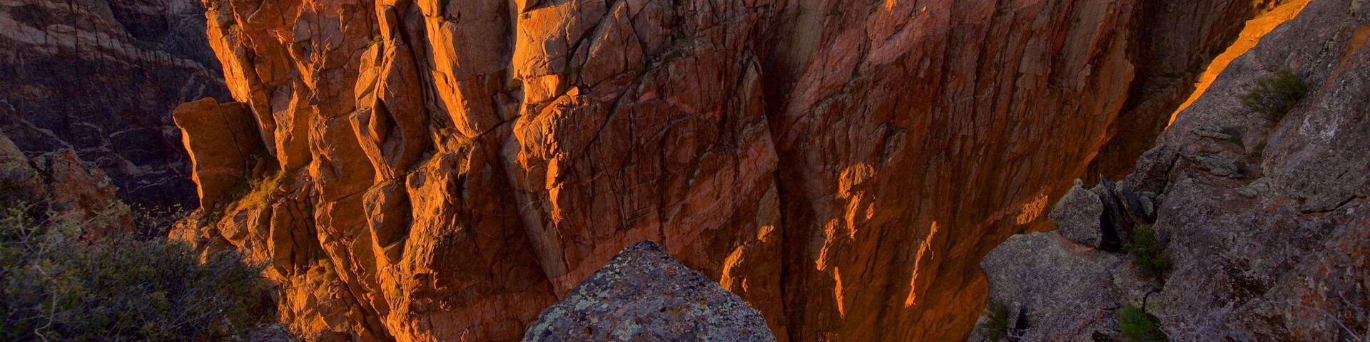 Montrose featuring a gorge or canyon, landscape views and a sunset