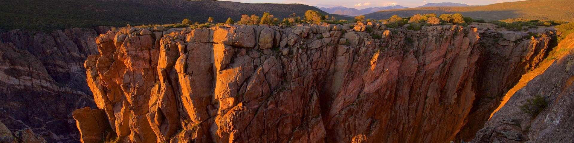 Montrose featuring a gorge or canyon, landscape views and a sunset