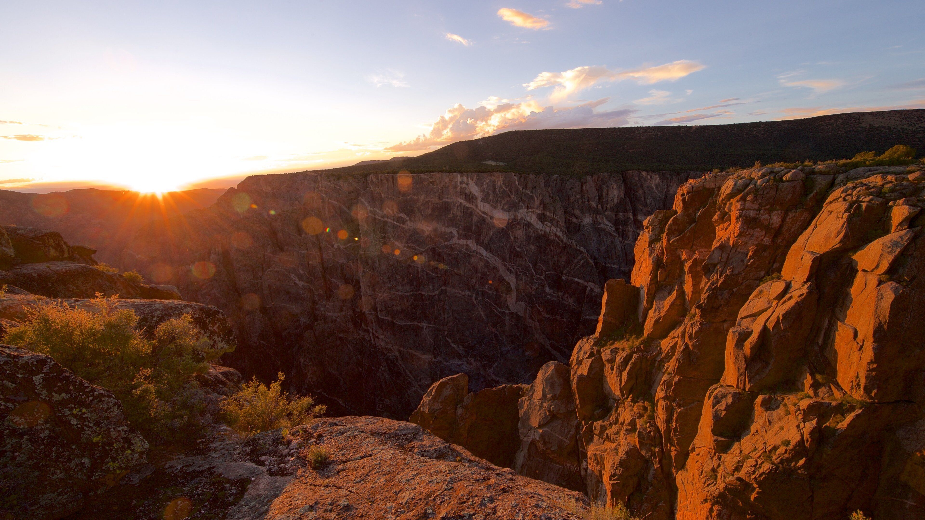 Montrose which includes a sunset, a gorge or canyon and tranquil scenes