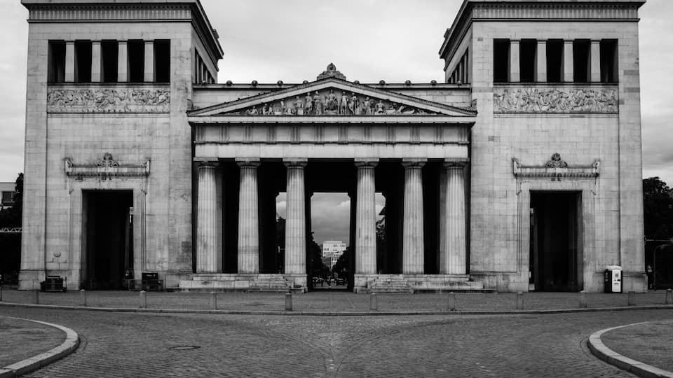 A grand neoclassical building with large columns and a central pediment.