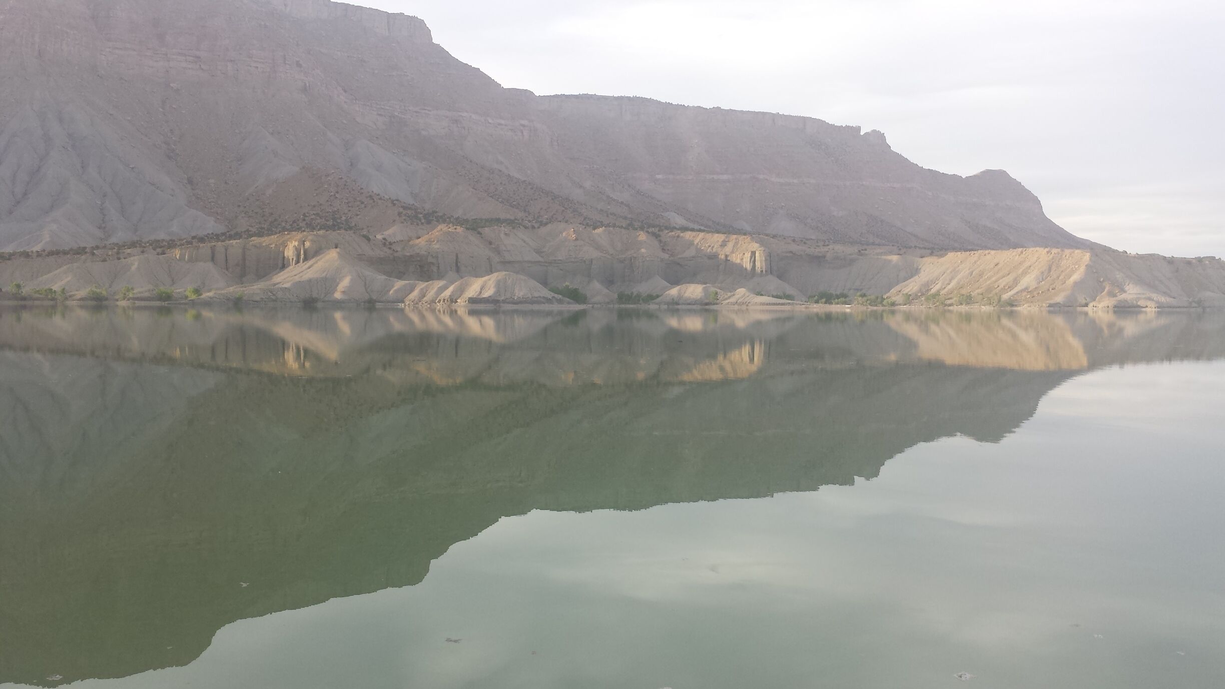 While fishing the reservoir, I took this picture of the mountsinside. The reflection off the water makes it look like an arrow carved in the mountainside. 
#LOVEMYTOWN
#LOVEMYTOWNSWEEPSTAKES