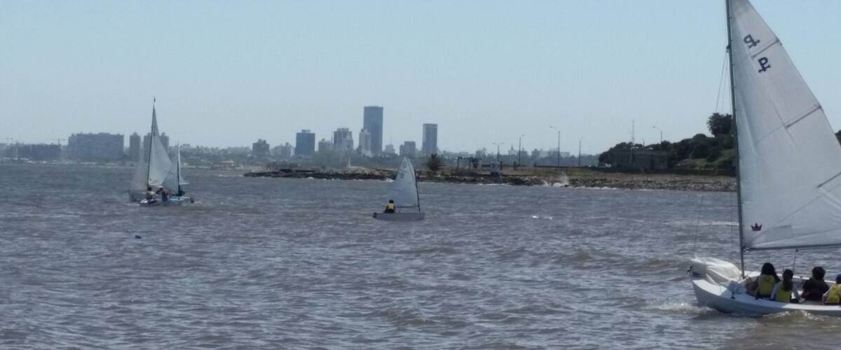 Sailing and Montevideo skyline