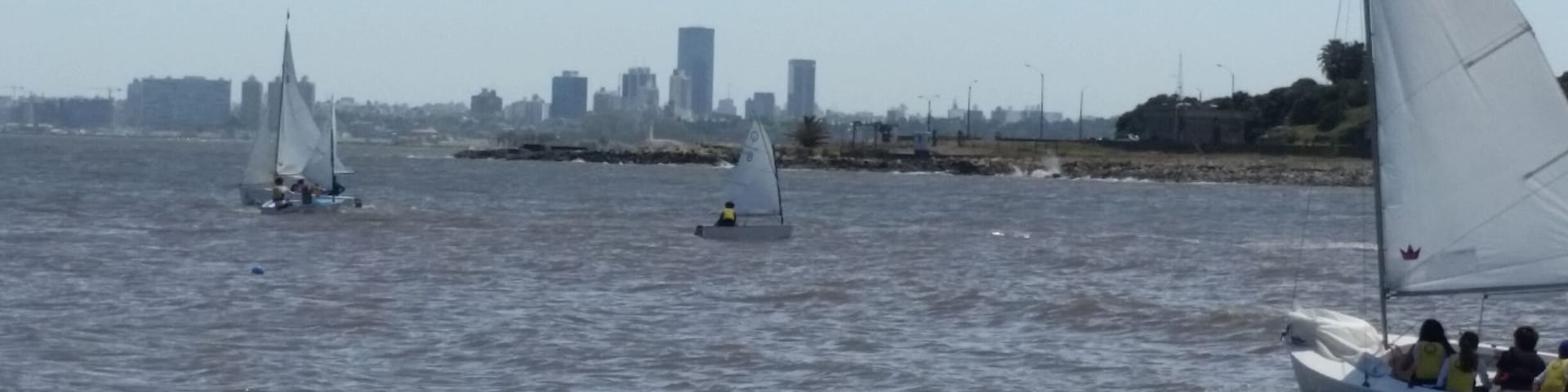 Sailing and Montevideo skyline