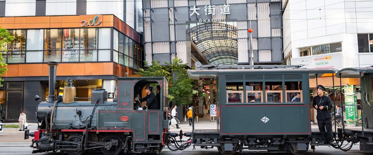 Matsuyama featuring street scenes, heritage elements and railway items