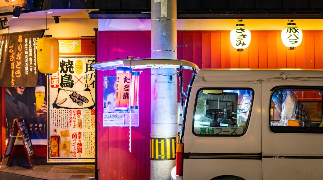 Matsuyama showing night scenes and signage