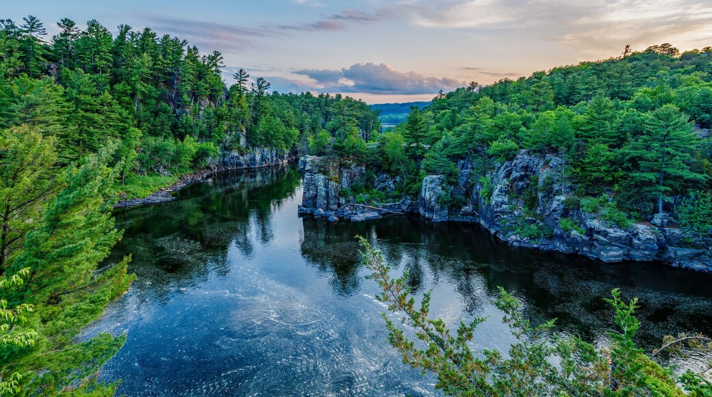 St. Croix River during sunset with colorful sky at Interstate State Park in St. Croix Falls Wisconsin.