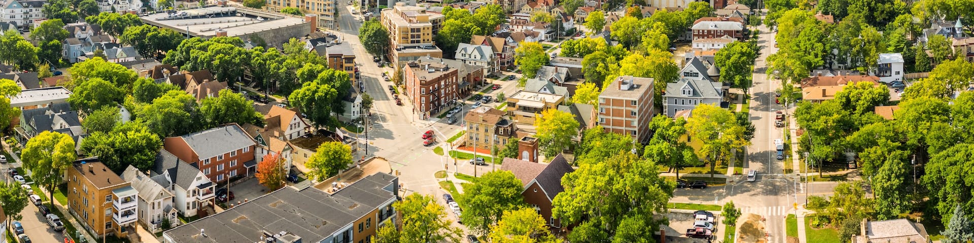 Madison skyline and Wisconsin State Capitol. The Wisconsin State Capitol, houses both chambers of the Wisconsin legislature, Supreme Court and the Office of the Governor.