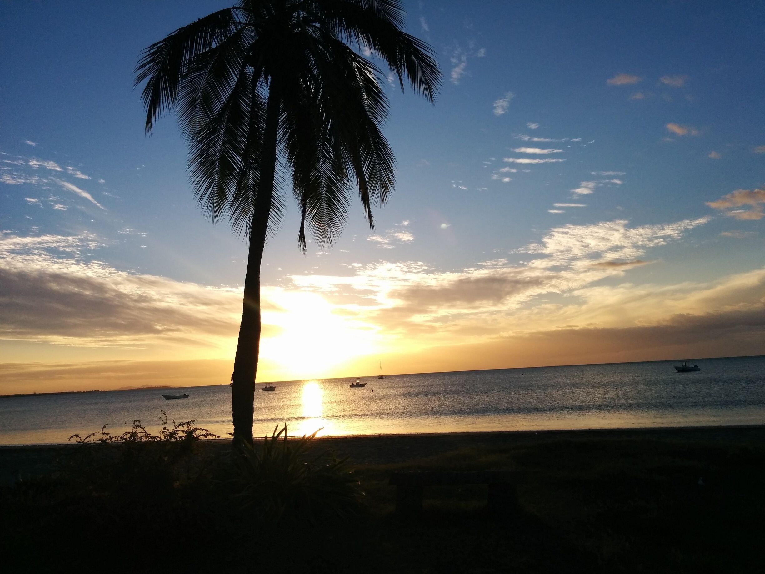 Enjoy the spectacular sunsets in Nadi, on Fiji's main island. Wailoaloa Beach.