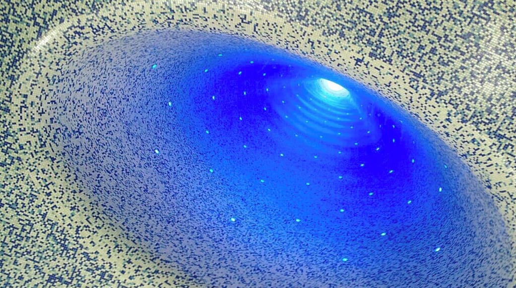 Opened in September 2012, the Toledo Metro Station was the 16th station built on Naples Metro Line 1. Designed by the Spanish Firm Oscar Tusquets Blanca, at 50 meters deep, the station extends below the ground water and is the deepest metro station built on Line 1 to date. One of Metro Napoliâs Metro Art Stations, it was designed around the themes of water and light. Curated by Achille Bonito Oliva, works of art include two William Kentridge mosaics, designed by the South African artist and realised by Neapolitan craftsmen. In the deepest corridor of the station are Robert Wilsonâs Light Panels and works by Achille Cevoli.