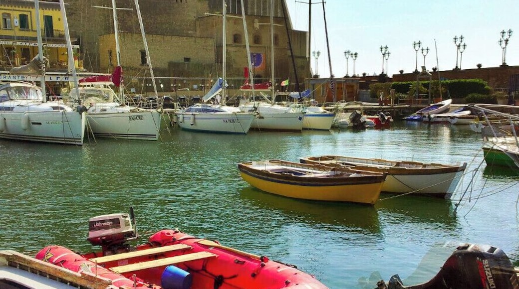 Castel dell'Ovo (in Italian, Egg Castle) is a seaside castle located on the former island of Megaride, now a peninsula, on the gulf of Naples in Italy. The castle's name comes from a legend about the Roman poet Virgil, who had a reputation in medieval times as a great sorcerer. In the legend, Virgil put a magical egg into the foundations to support the fortifications. If something had broken the egg, the castle was destroyed and a series of disastrous events would have involved the city of Naples.