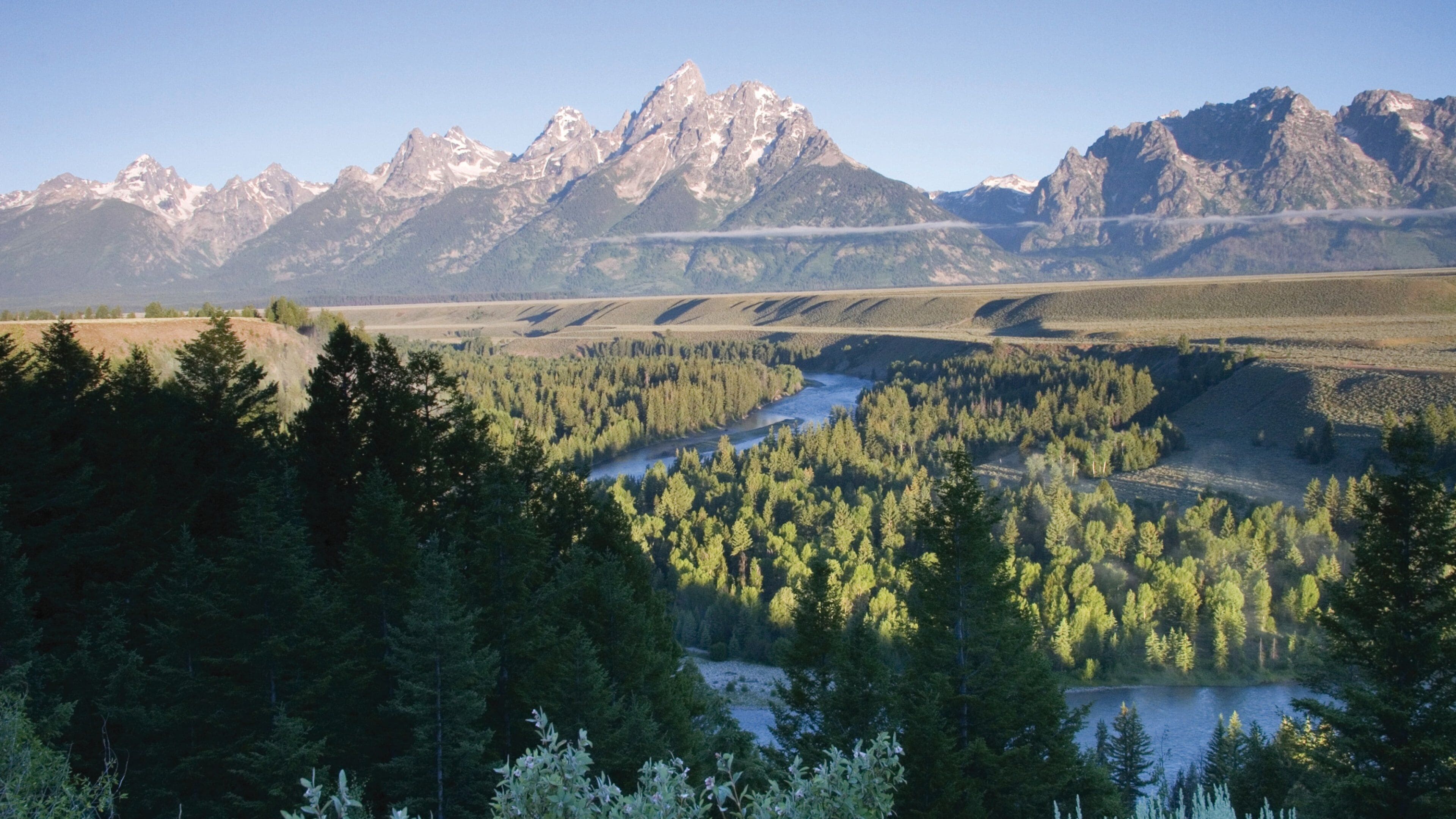 Jackson Hole mit einem Fluss oder Bach, Landschaften und Berge