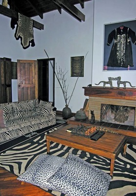 This charming B&B is in a suburb of Nairobi, within a 10 minute walk to the Giraffe Centre. 
The living room felt like Hemingway should be sitting on the couch.