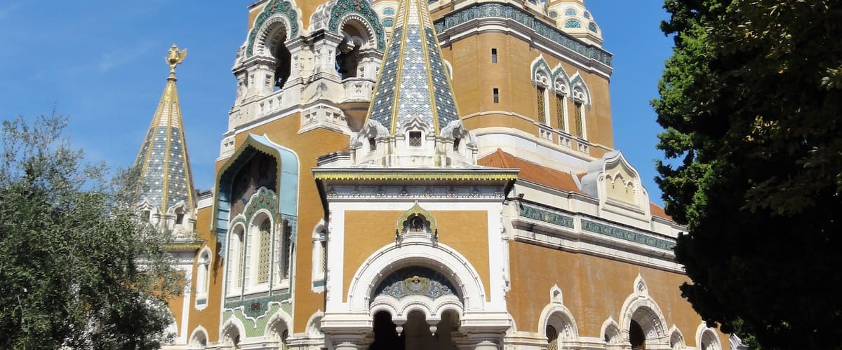 A historic church with ornate architecture and multiple domes.