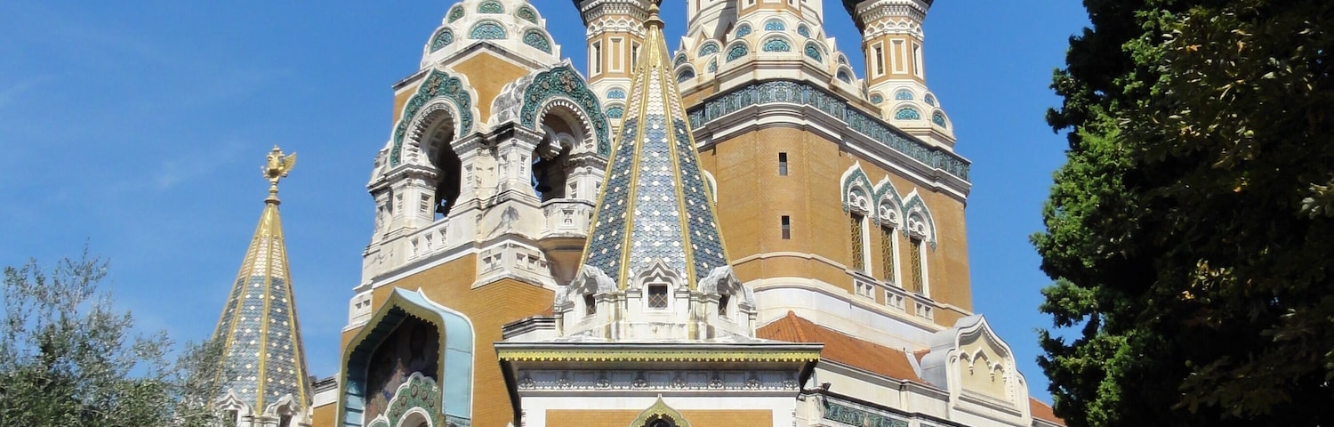 A historic church with ornate architecture and multiple domes.