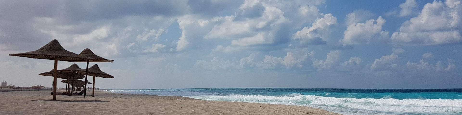 Sun set on the beach in Egypt north coast / dahab / hurgada / sharm el sheikh / taba / alexandria - best place for vacation under umbrella - holiday relaxation beach sand inspiration happiness tan.