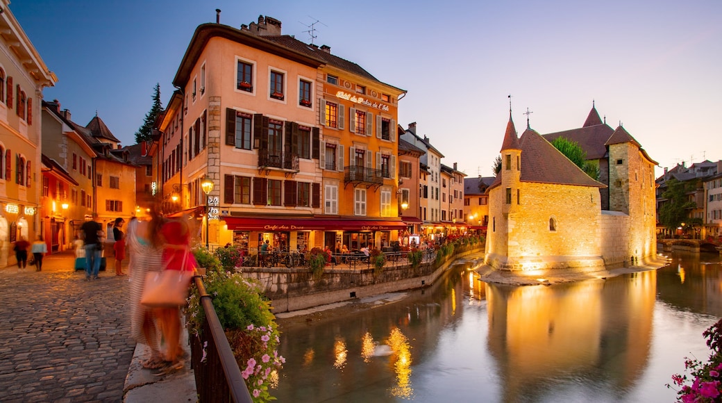 Annecy featuring a sunset and a river or creek