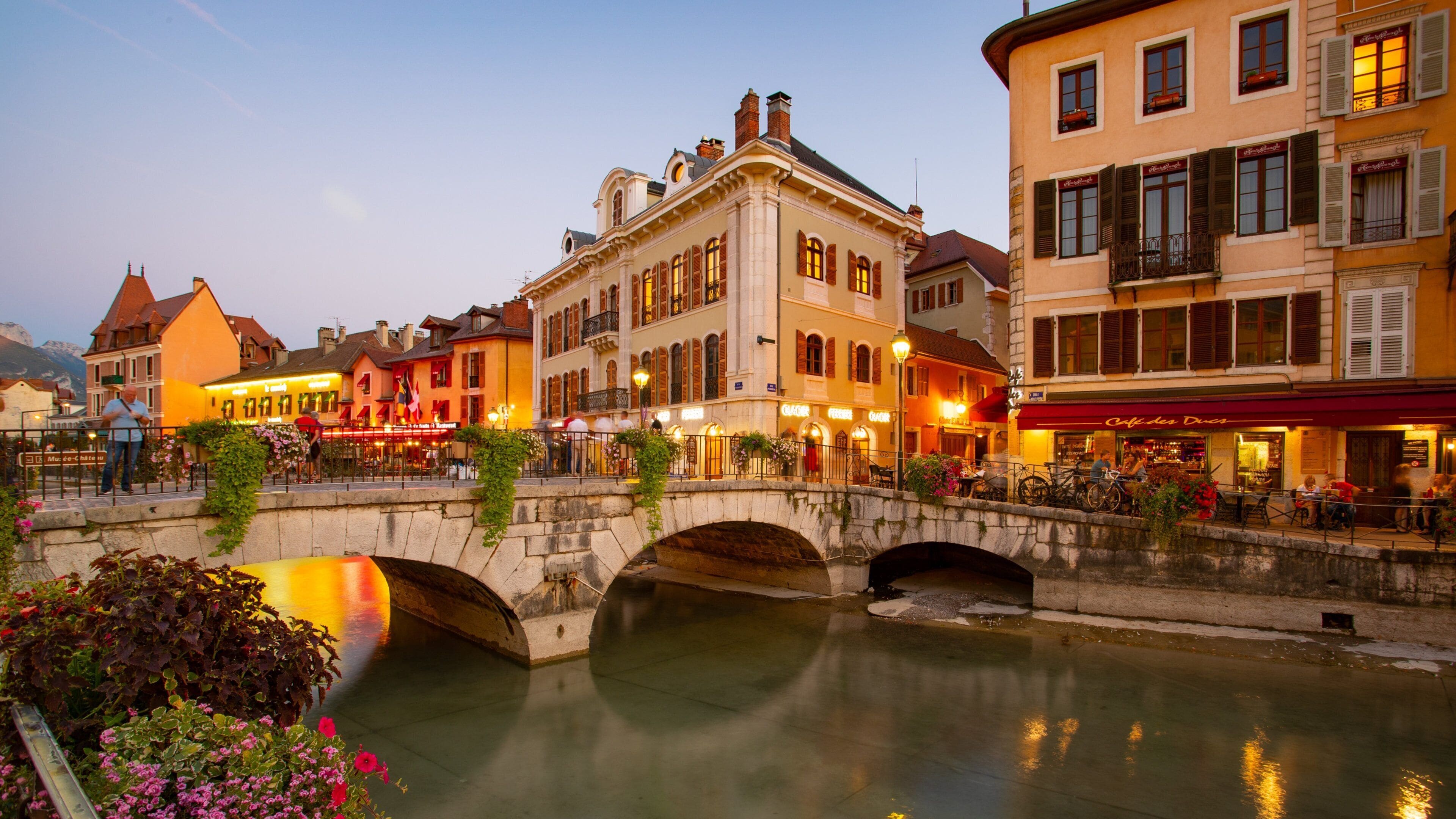 Annecy which includes a sunset and a river or creek