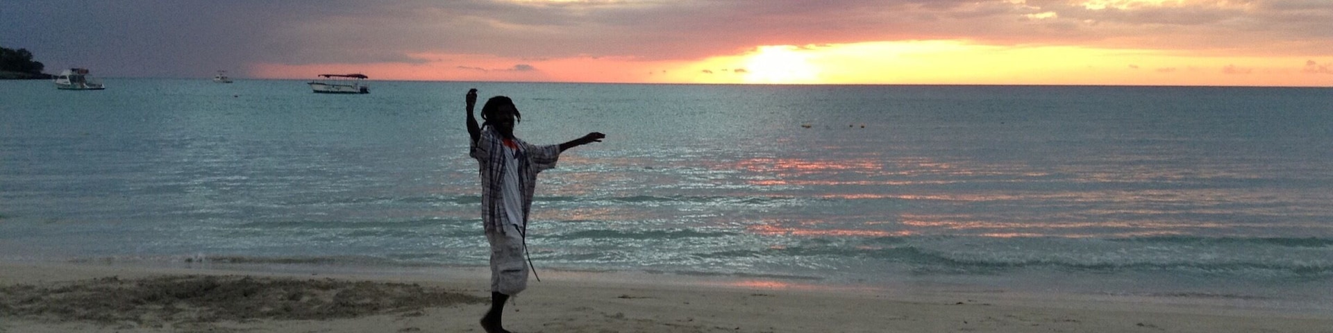 A chance shot of a local Rasta enjoying life in Negril. I was actually trying for the sunset.