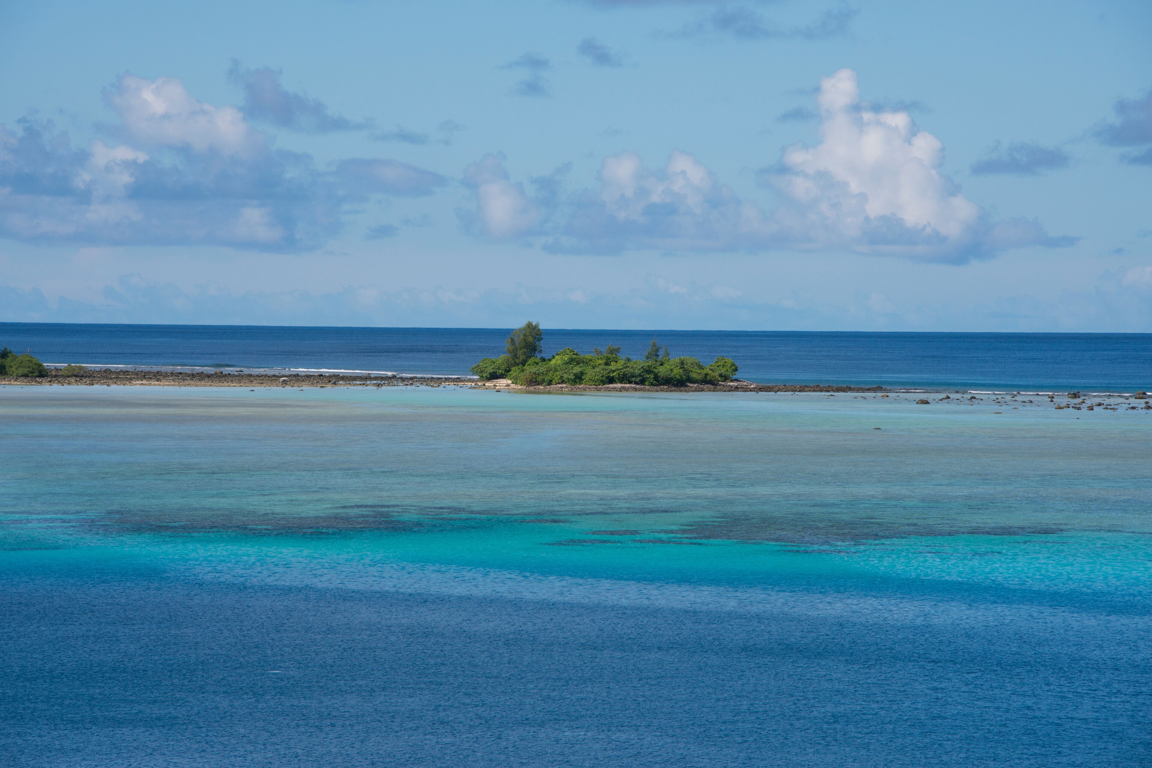 Melanesia, Makira-Ulawa Province, Solomon Islands, island of Owaraha or Owa Raha (formerly known as Santa Ana). Clear shallow bay with coral reef.