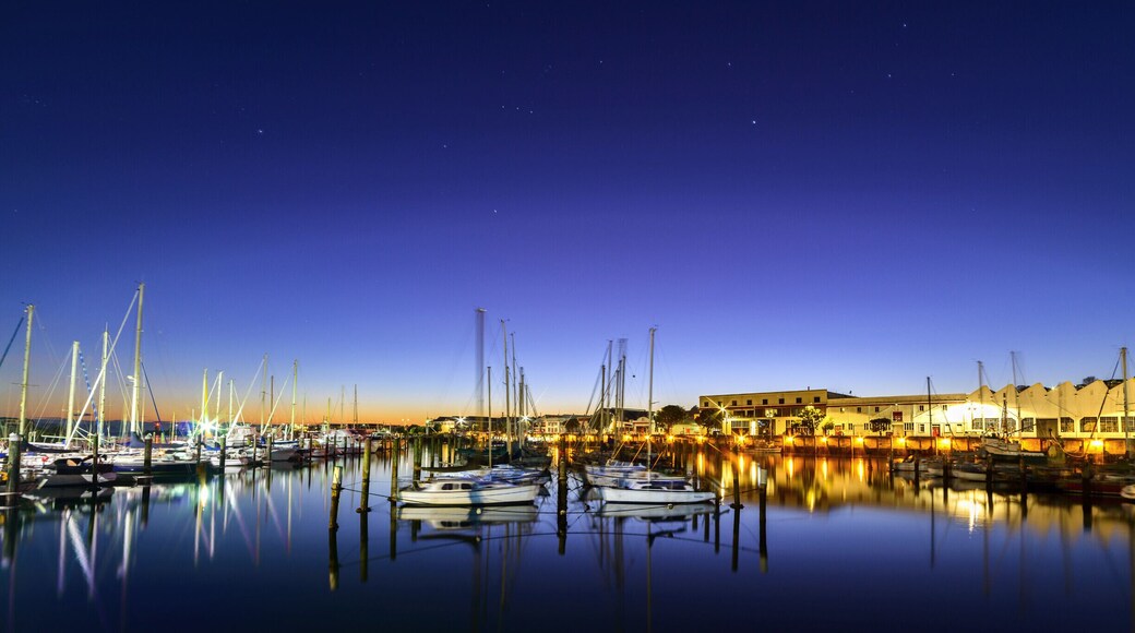 The original port of Napier was located in the area of Ahuriri, just beyond the buildings visible on the right of this photo., and was known as the Iron Pot port.
This port area has now been superseded by the Breakwater Port, and Ahuriri is home to mainly pleasure boats and inshore fishing vessels, and the old warehouses and stores are now home to restaurants, bars, cafe's, offices and apartments.
It was very peaceful this morning standing watching the stars fade and the sun rise, and people arriving to take their boats out for the day.
The constellation of Orion is visible in this photo in the centre of the sky.