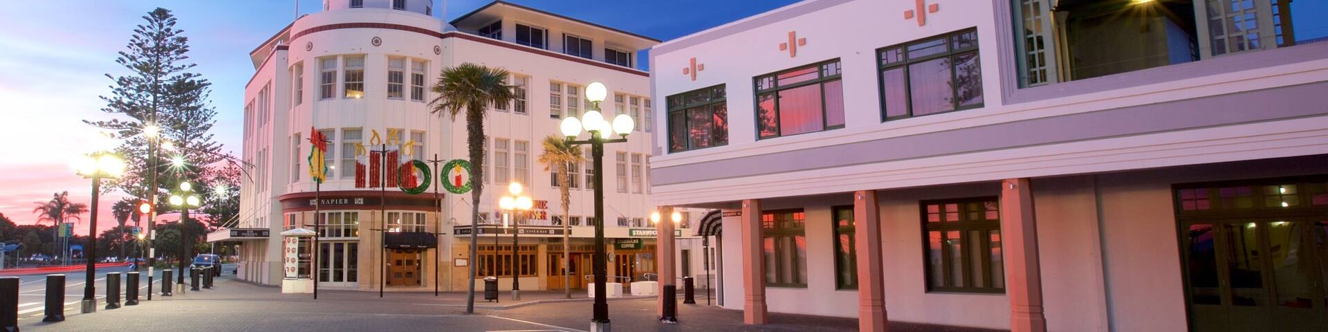 Napier showing a square or plaza and a sunset