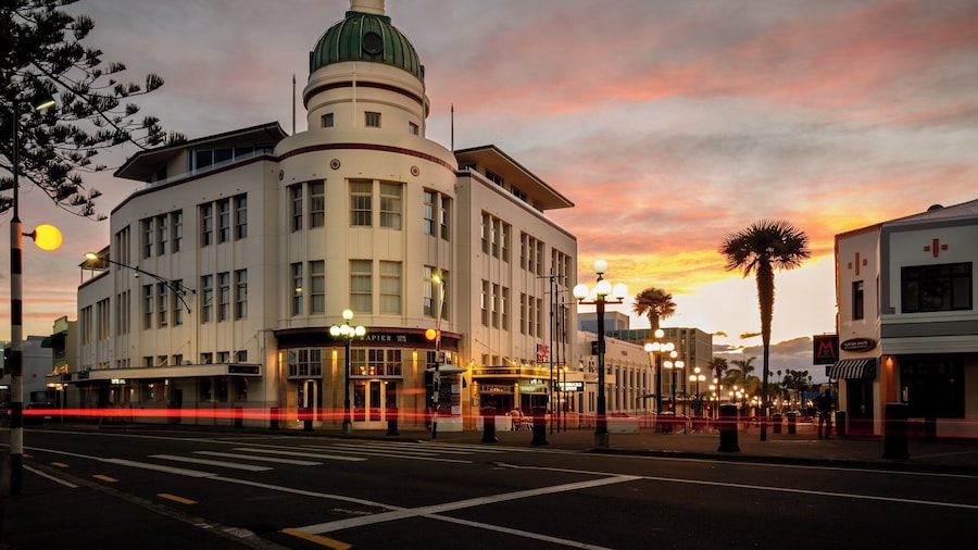 This is Marine Parade in Napier.
Napier is regarded as one of the most complete examples of an Art Deco city in the world, having been rebuilt after a large 1931 earthquake.
The T&G Building shown here has been converted into high end apartments and entertainment spaces and is one of the landmarks of Art Deco Napier