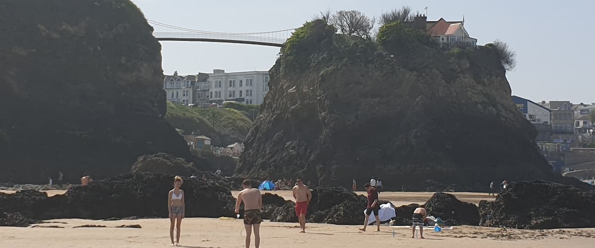 This lovely suspension bridge connects the one solitary house on the beach island with the rest of the mainland