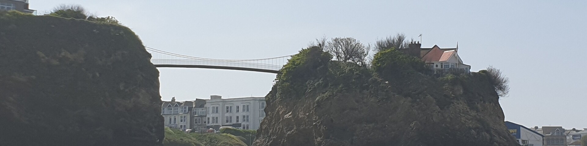 This lovely suspension bridge connects the one solitary house on the beach island with the rest of the mainland