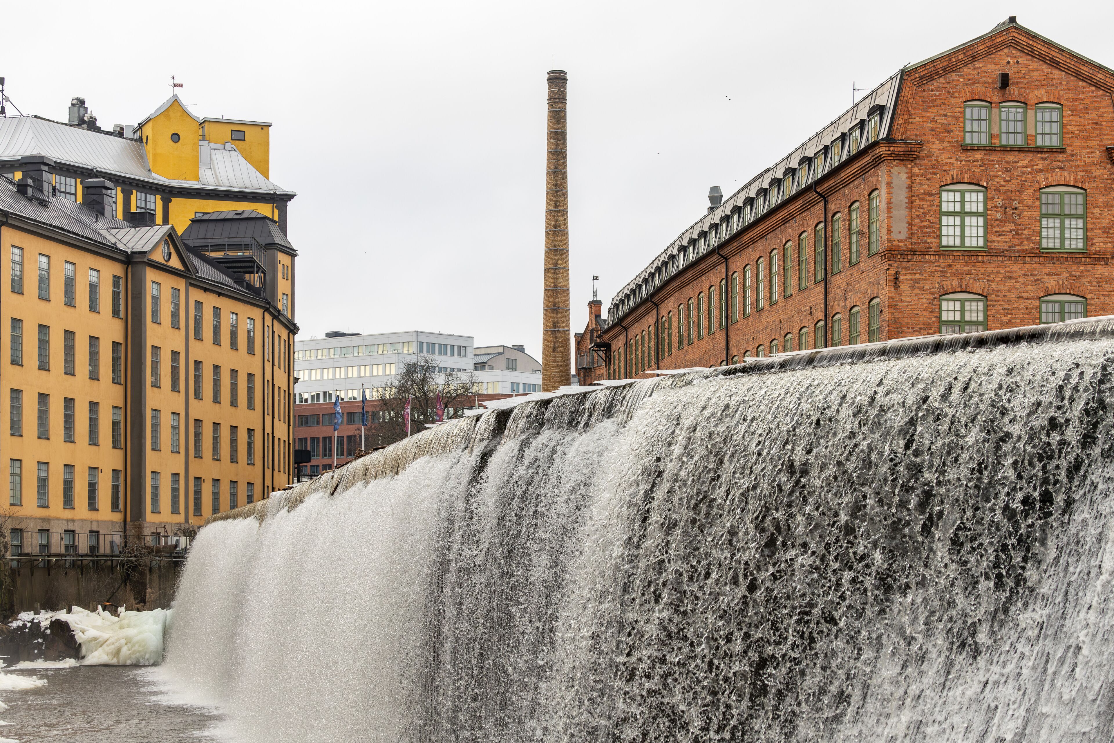 Norrköping, Sweden The large landmark waterfall on the Motala River in the old textile mill town center.