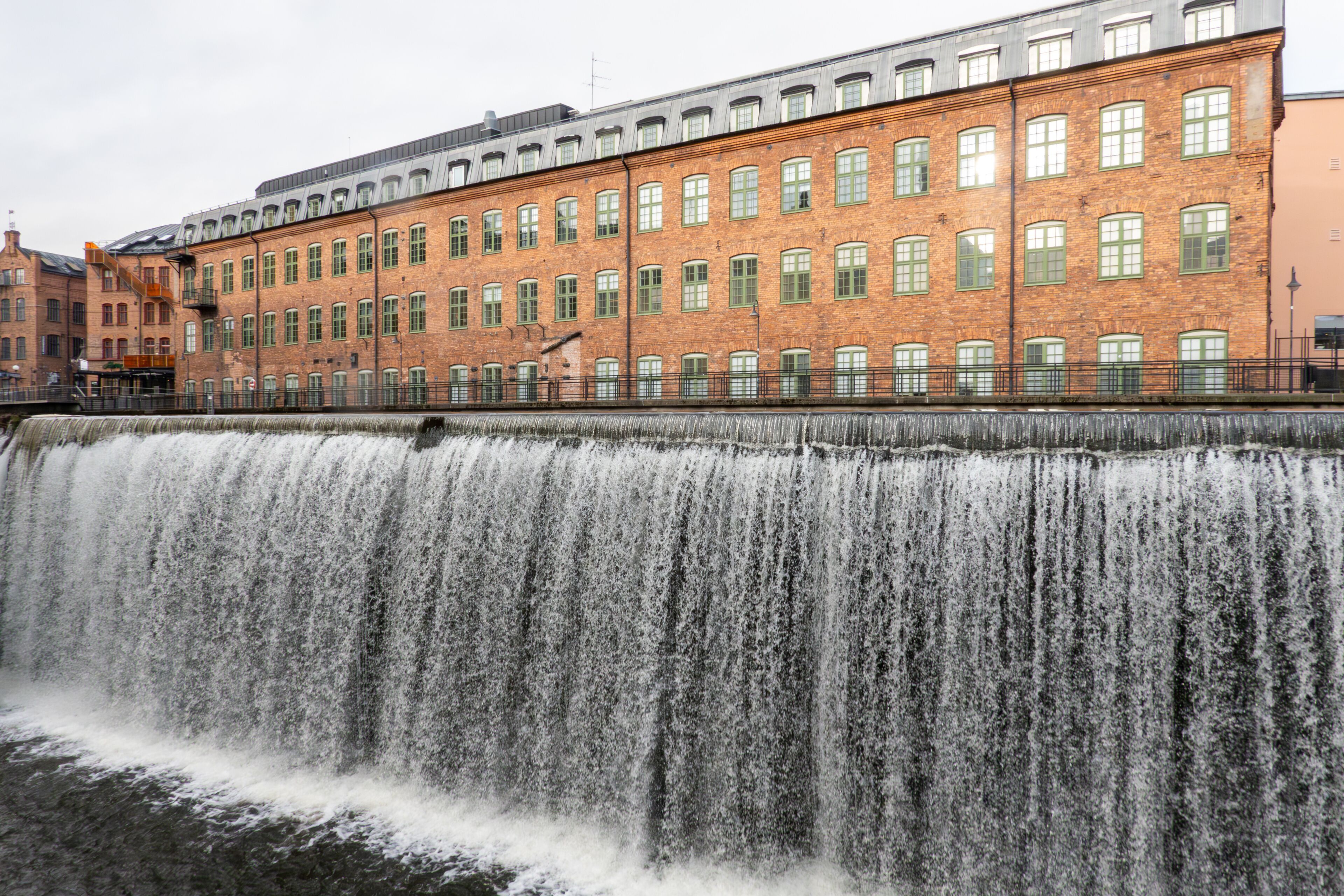 Norrköping, Sweden The large landmark waterfall on the Motala River in the old textile mill town center.
