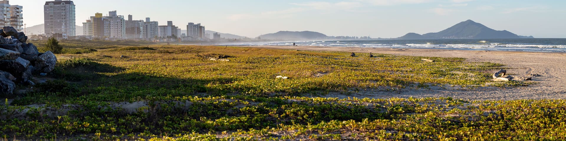 Panoramic view of the beach in the city of Navegantes on a sunny day, Santa Catarina, Brazil.