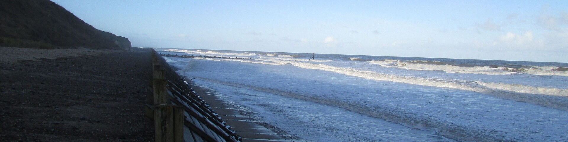 Looking along the sea defences on Trimingham beach near the village of Trimingham in the English county of Norfolk in England.