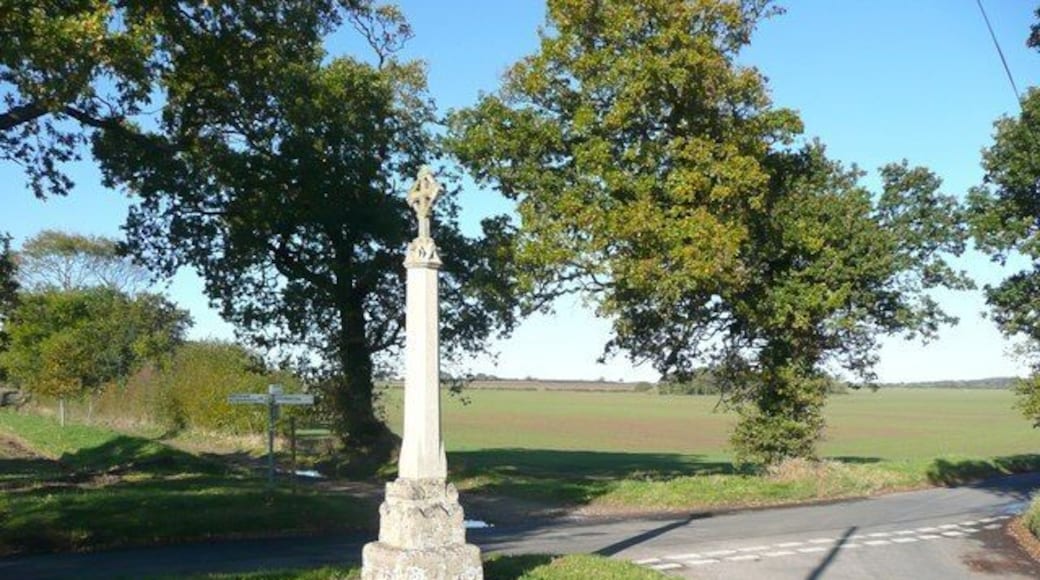 Wayside Cross, Church Road, Aylmerton This is a medieval cross, but was restored in the 19C, when it appears that most of the shaft and all the head were renewed. The road to the right is Church Road, leading to Aylmerton village, and the track half-left is a byway leading to East Beckham.