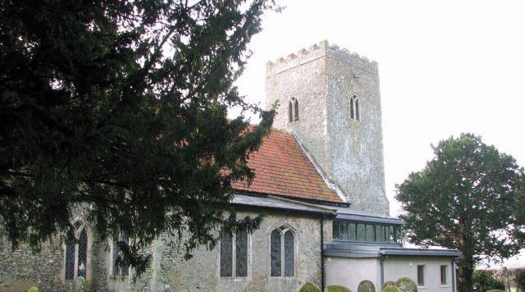 All Saints church - the new extension. All Saints church > 1692081 - 1692114 dates from the 14th century and is a Grade II listed building. Its south porch is a later addition dating from the 15th or early 16th century, and an extension built onto the north wall and providing modern facilities was completed in 2009. The church houses a number of medieval survivals, amongst them several wall paintings - one depicting St Christopher, another the Annunciation > 1692151. A very rare depiction of a group of women surrounded by three devils, dominated by Titivallus - the Demon of Gossip - is painted on the north nave wall, clearly meant as a warning against gossiping. The rood screen > 1692117 is late C15. The octagonal font > 1692132 is of Purbeck marble and dates from Norman times, whereas the wooden painted cover was added in 1934.