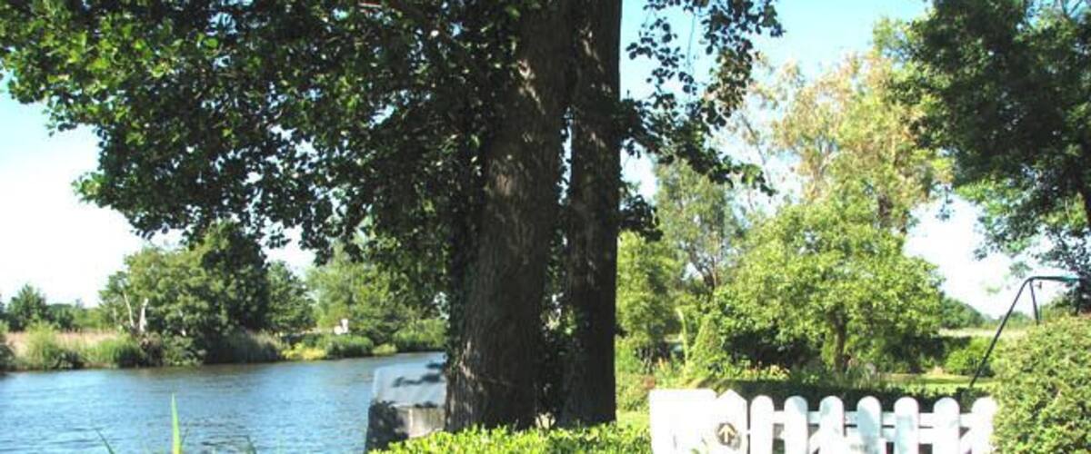Public footpath traversing private properties. This section of the path skirts the riverside gardens of adjoining properties. The walk > https://www.geograph.org.uk/photo/1358319 starts by St Mary's church > https://www.geograph.org.uk/photo/1280845 leading in westerly direction. It winds its way downwards > 1358328 to the River Yare, following a woodland edge before it reaches the bottom of the valley and the reed beds growing beside the river > 1358349. A footbridge > 1358351 leads over a drainage ditch and a short walk > 1358355 leads to the river bank > 1358357. A narrow path flanked by dense vegetation follows the river from here onwards until it emerges by the car park on Bramerton Common. The Wherryman's Way > https://www.geograph.org.uk/photo/1340030 is a 35-mile long distance footpath following the route of the Broads trading wherries between Norwich and Great Yarmouth. The route takes its name from the wherry - a large cargo-carrying barge whose black sails used to be a common sight on these waters. Ten circular village walks branch off this path along the way.